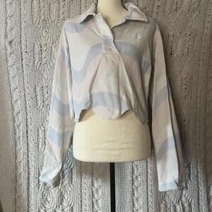 Samie Ryan pastel pink, white and blue cropped polo shirt with flower detail.